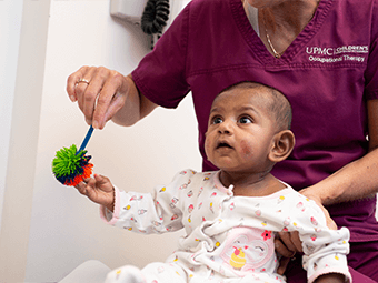 Baby getting checked out by a doctor