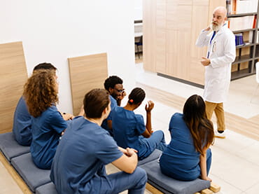 Doctor training new staff